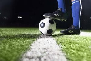 An image of a Foot on a soccer ball.