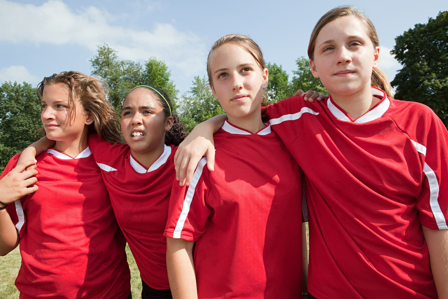 An image of female soccer players on a soccer field.