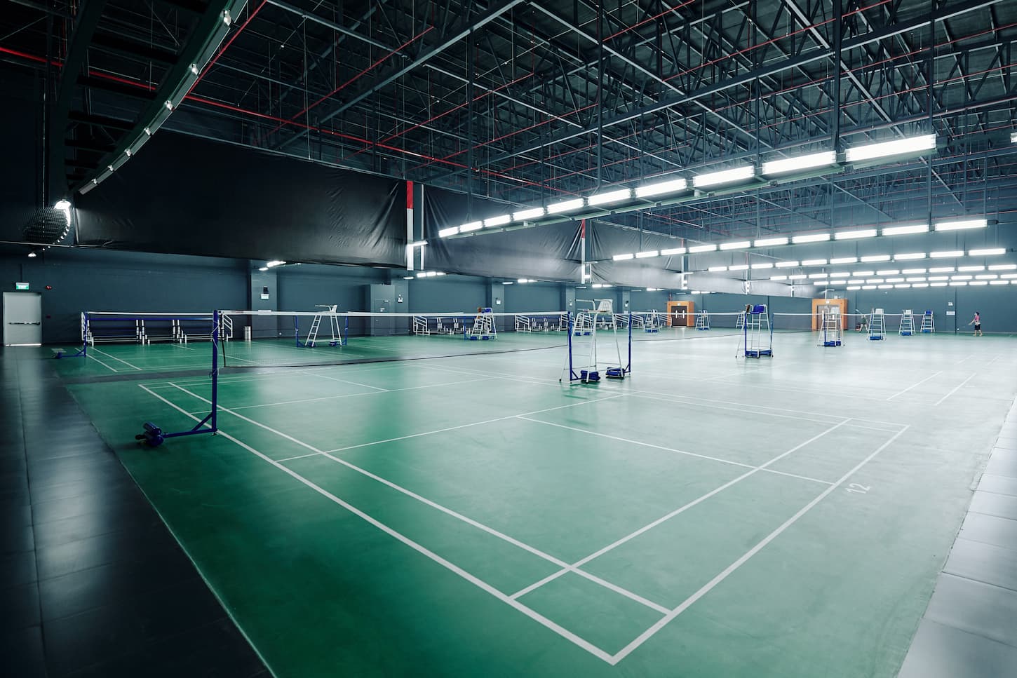 An image of Courts for playing tennis and badminton.