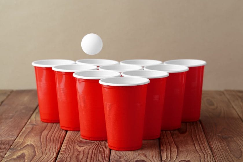 An image of a College party sport - beer pong.