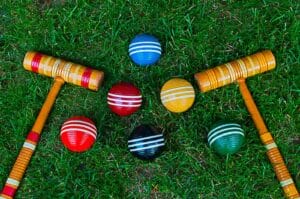 An image of croquet mallets displayed in different colors.